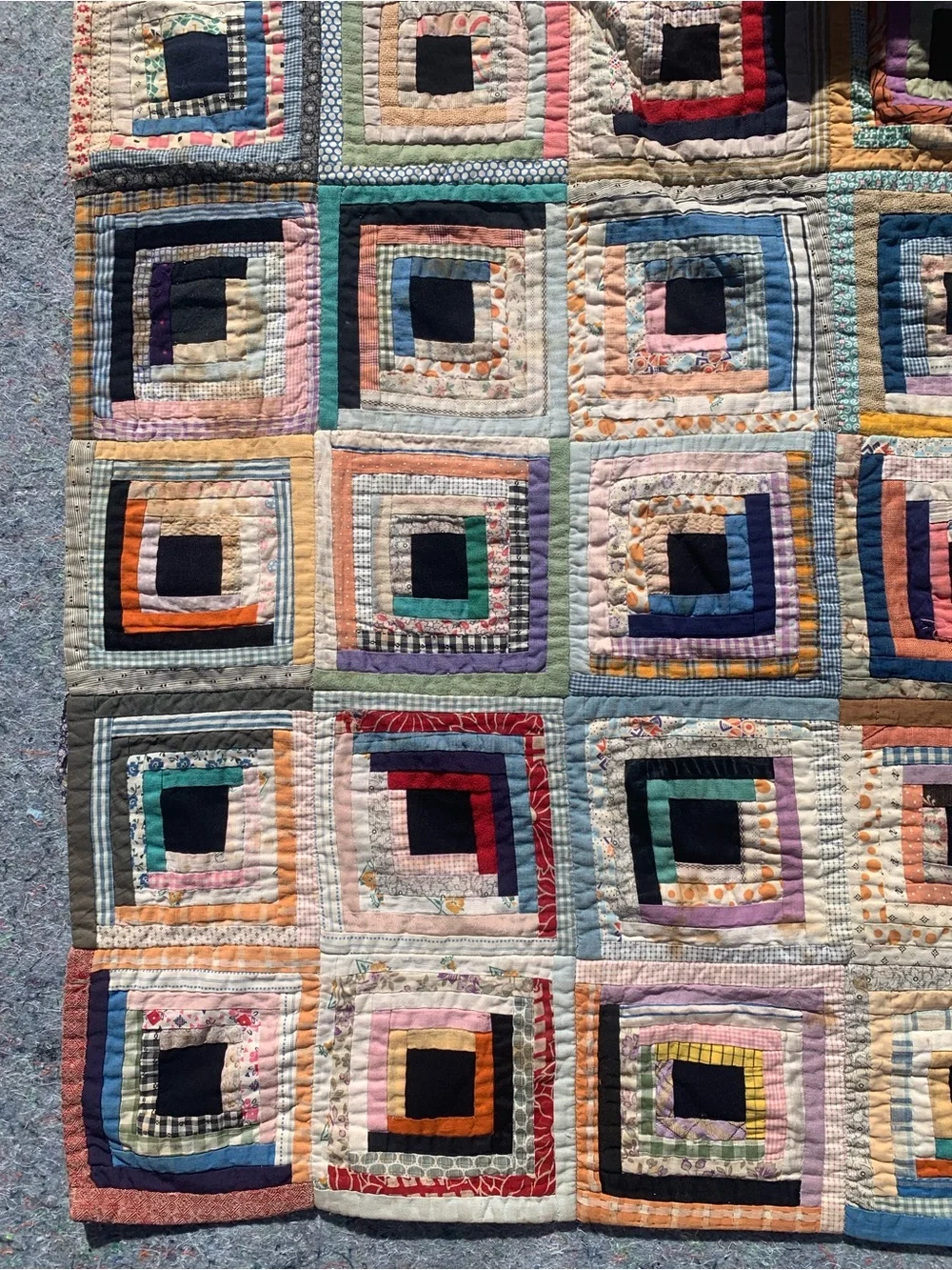 Antique 1940s or older multicolor multi-material log cabin quilt